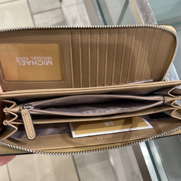 MICHAEL KORS Leather Continental Phone Holder Wristlet Wallet 
Camel 
NWT - Picture 9 of 16